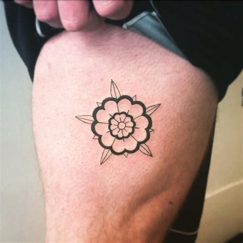 tudor rose sleeve tattoo.